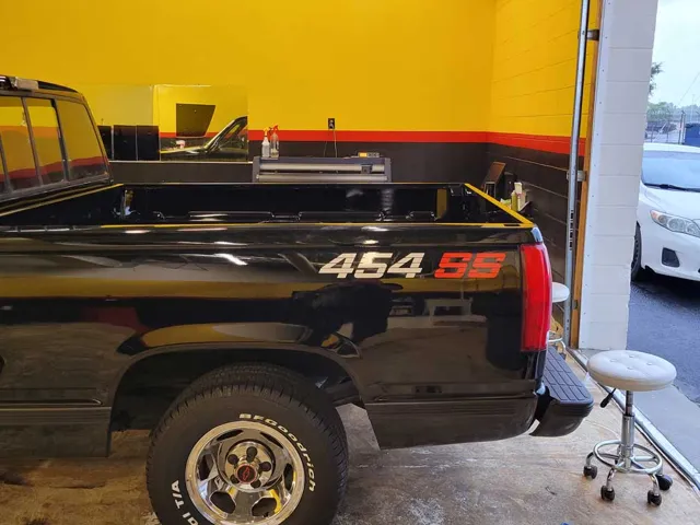 Chevrolet 454 SS pickup in the bay at Black Optix Tint Colonial Heights